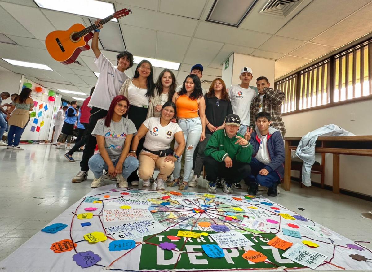 A group of people posing for a photoDescription automatically generated