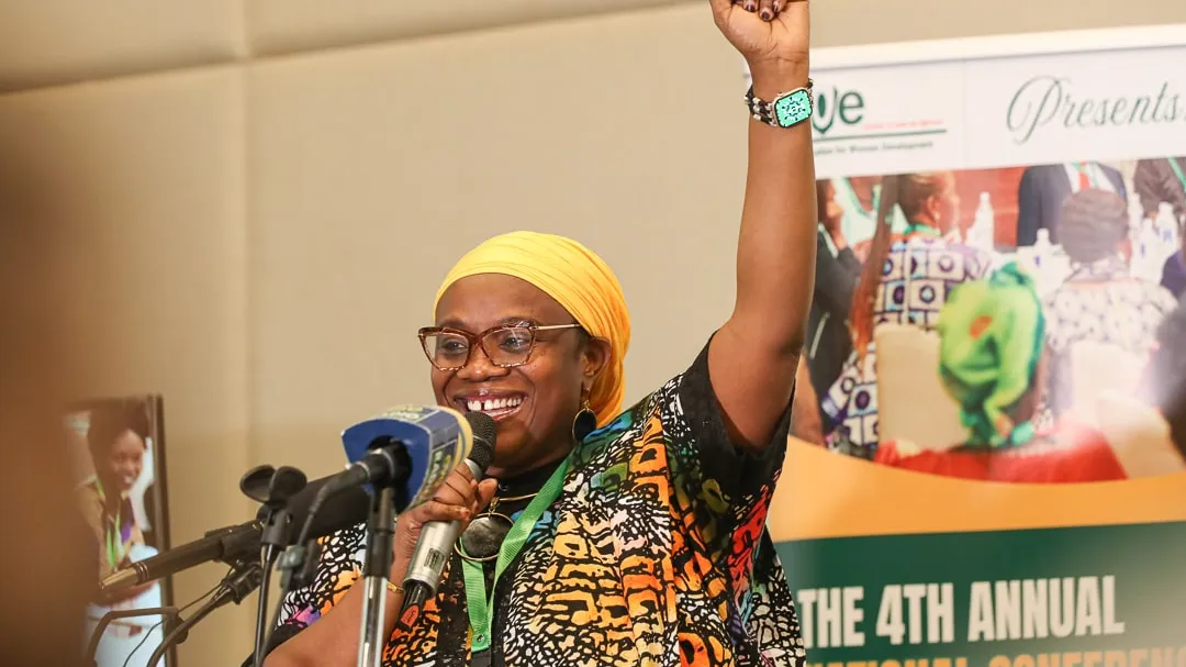 woman speaking at event