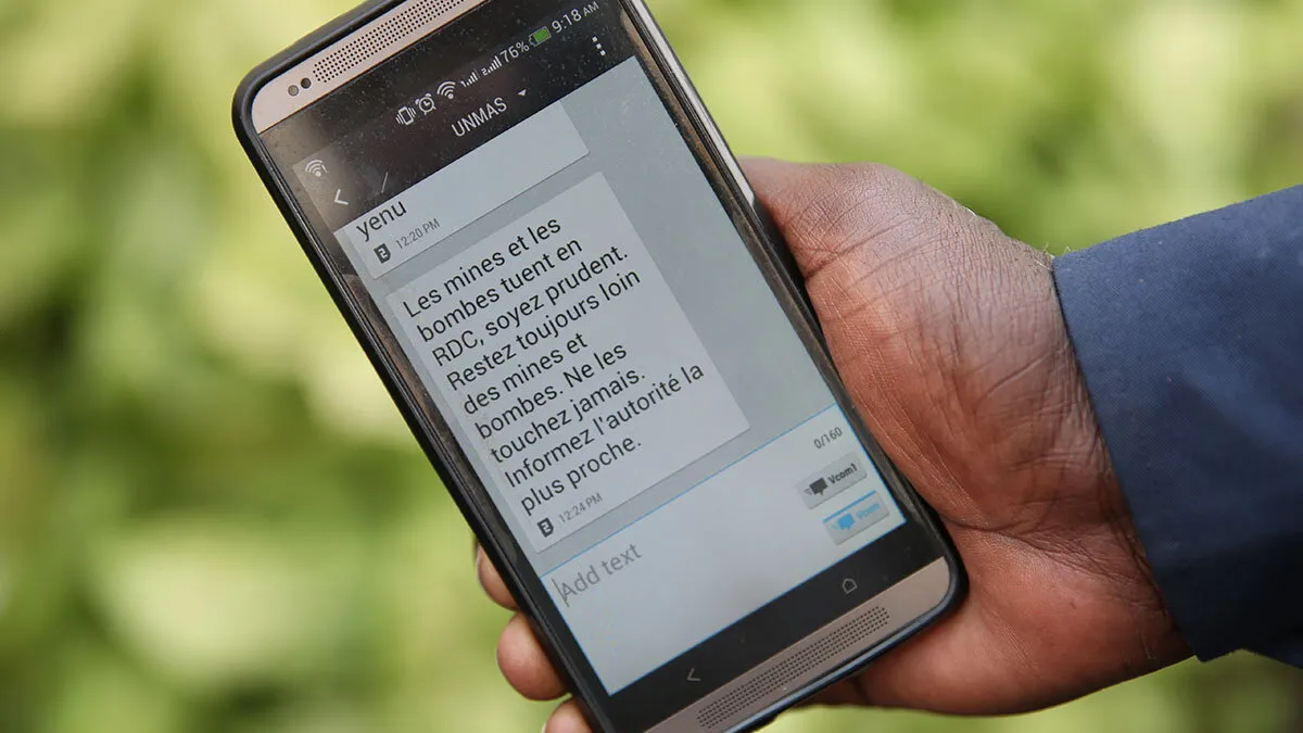 a phone screen showing mine awareness text message