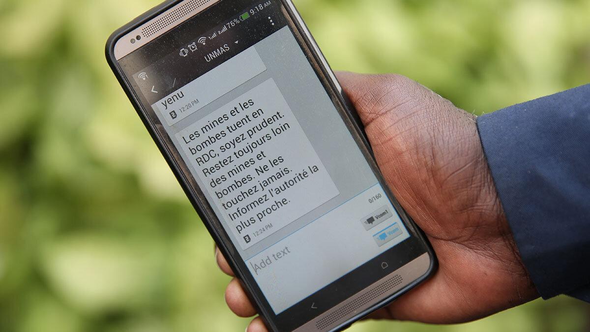 a phone screen showing mine awareness text message