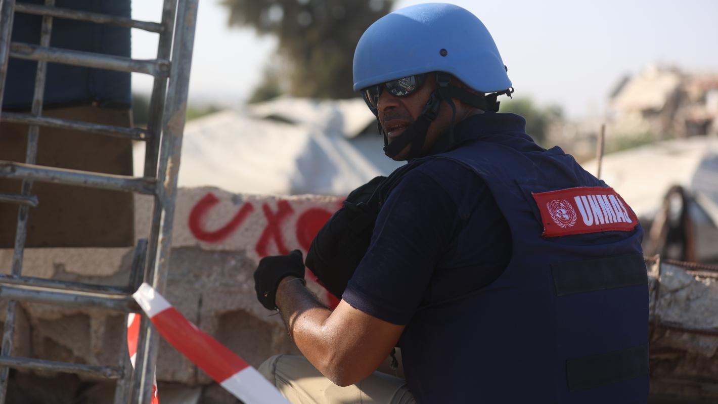 UNMAS EOD Officer marks explosive ordnance during an EHA in Khan Younis, Gaza.