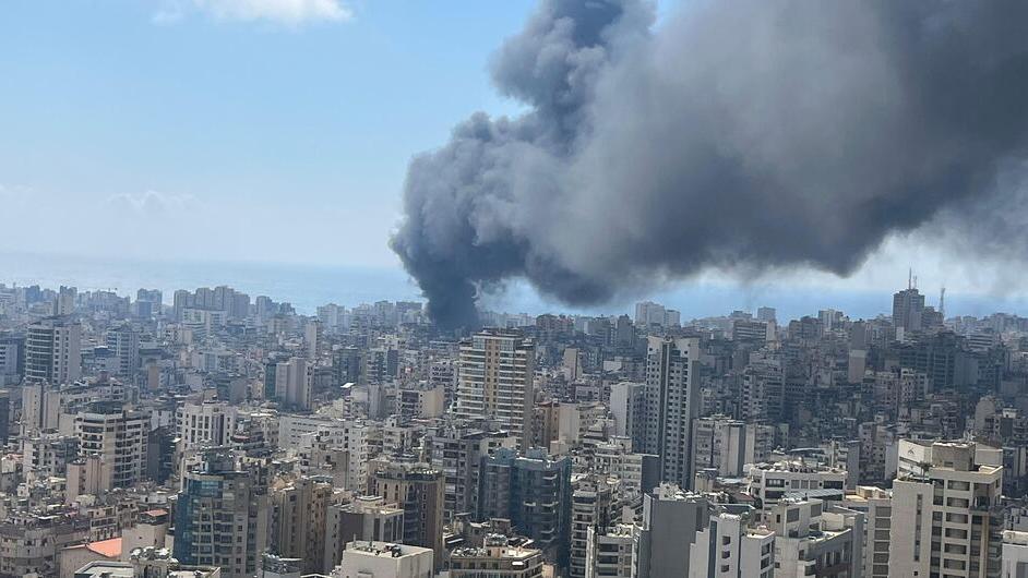Smoke rises over the Lebanese capital Beirut in the aftermath of an airstrike. Smoke rises over the Lebanese capital Beirut in the aftermath of an airstrike.