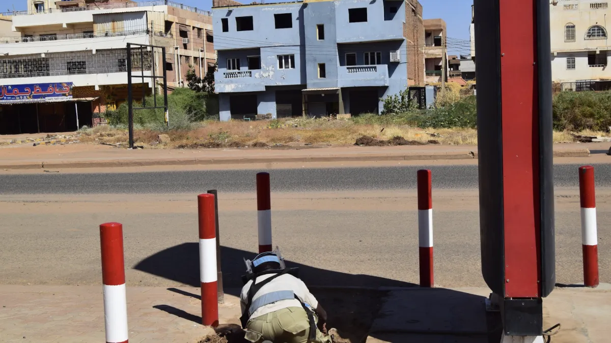 A deminer demining