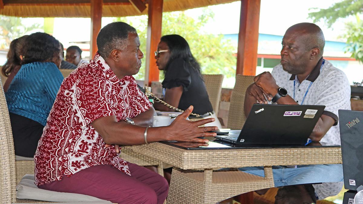 Chief of Regional IT Security Unit, Michael Mwaura (l) talks with ISO Consultant Chief of Regional IT Security Unit, Michael Mwaura (l) talks with ISO Consultant