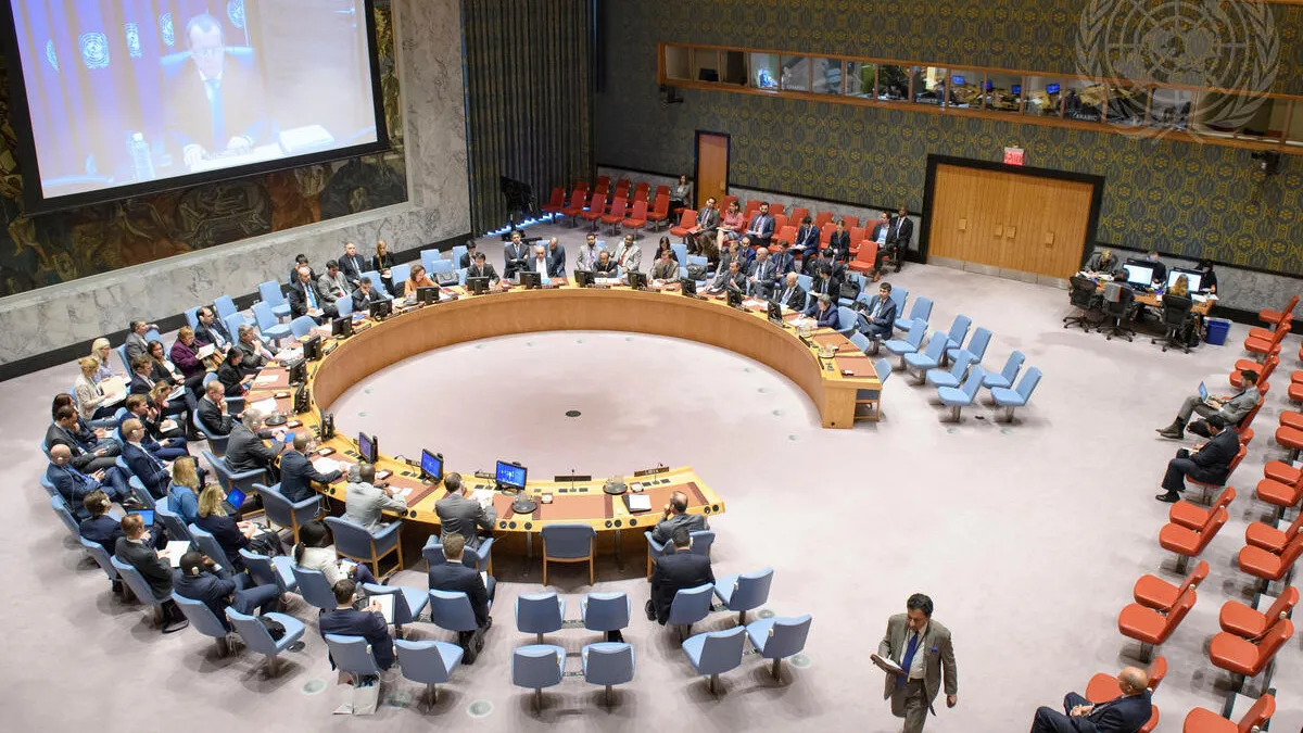 A wide view of the Security Council Chamber as Martin Kobler (shown on screen), Special Representative of the Secretary-General and Head of the UN Support Mission in Libya (UNSMIL), briefs the Council via video teleconference.