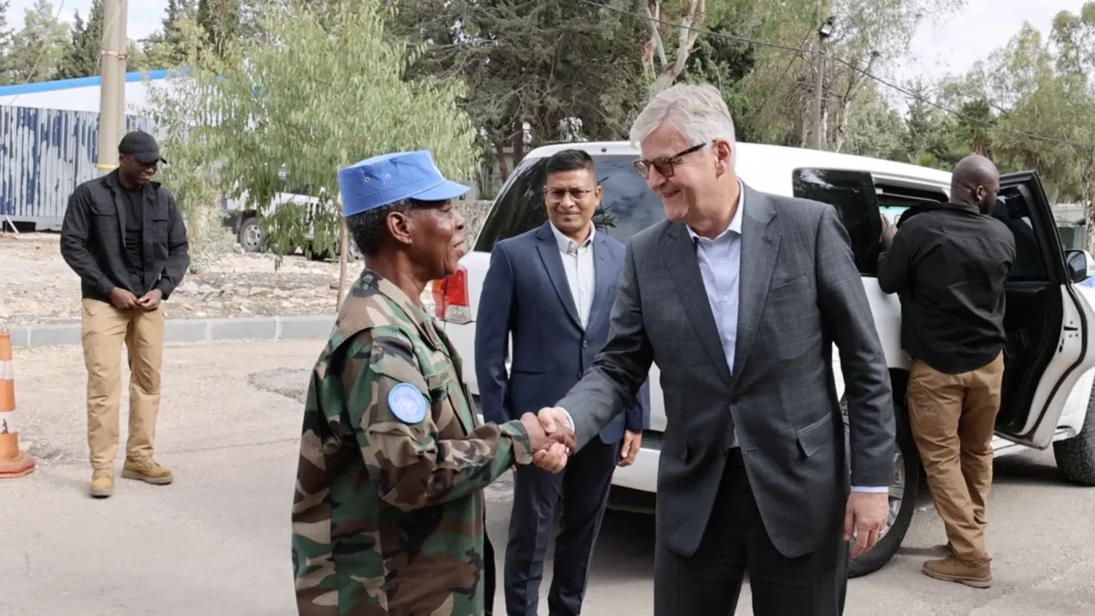 Major General Anita Asmah of Ghana shakes hands with USG for Peace Operations Jean-Pierre Lacroix, welcoming him to UNDOF.