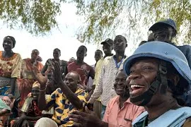 peacekeepers with community members.