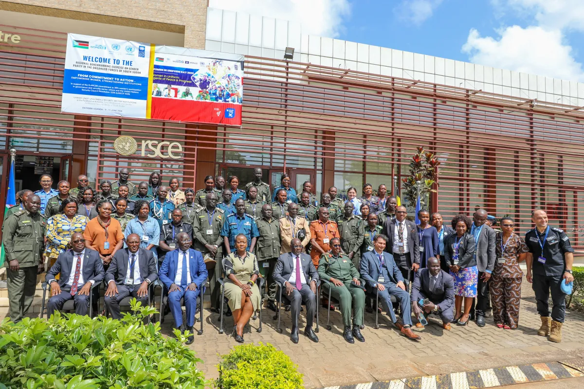 A group photo of participants and guest speakers.