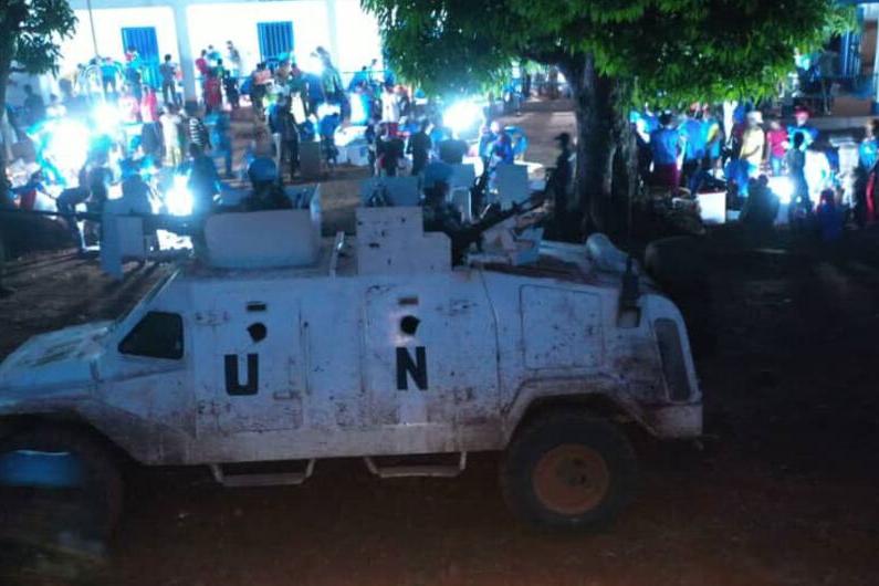 UN vehicle at night.