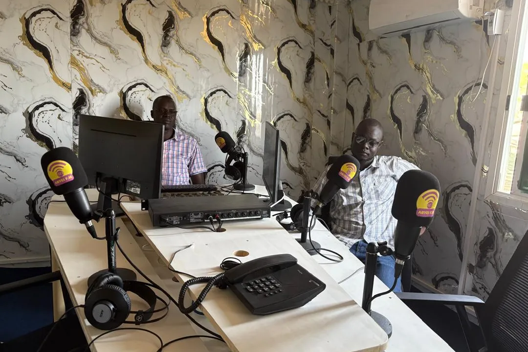 Karbino Dut Aguek with his colleague Makuac Deng Ayei in Abyei FM’s new studio