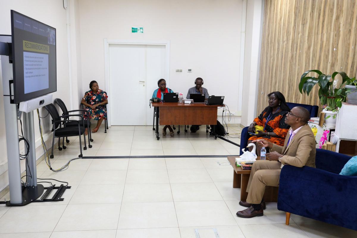 Mental Health Expert making virtual presentation to staff Mental Health Expert speaks