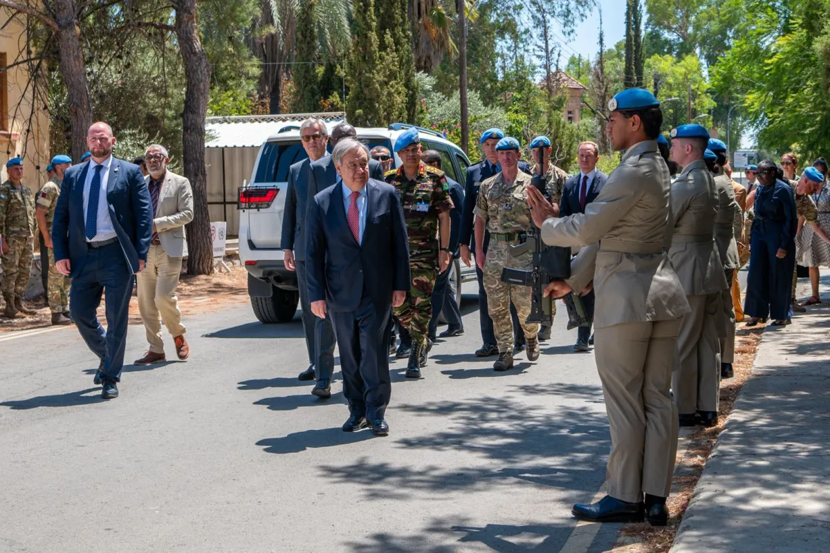 UN Secretary-General walking ahead of UN officials in Cyprus.