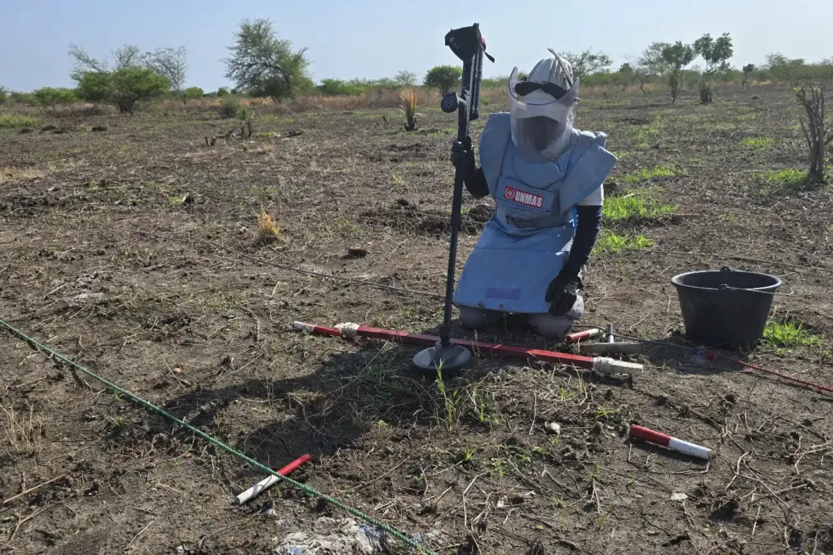 A deminer conducts clearance operations in Bilinyang Payam, Central Equatoria State, helping make land previously contaminated by explosive hazards safe for civilian use. \