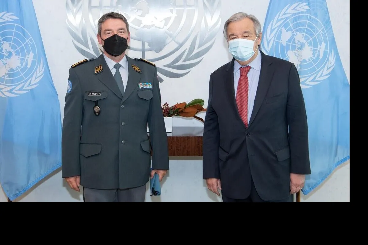 UN Secretary General Guterres stands next to Major General Gauchat