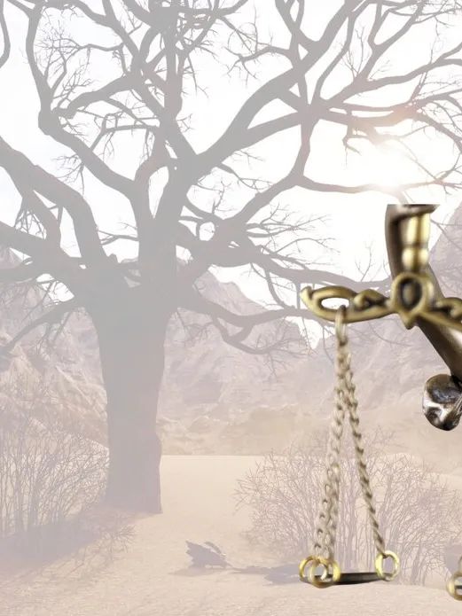 The symbol of Justice with an image of the desert in the background