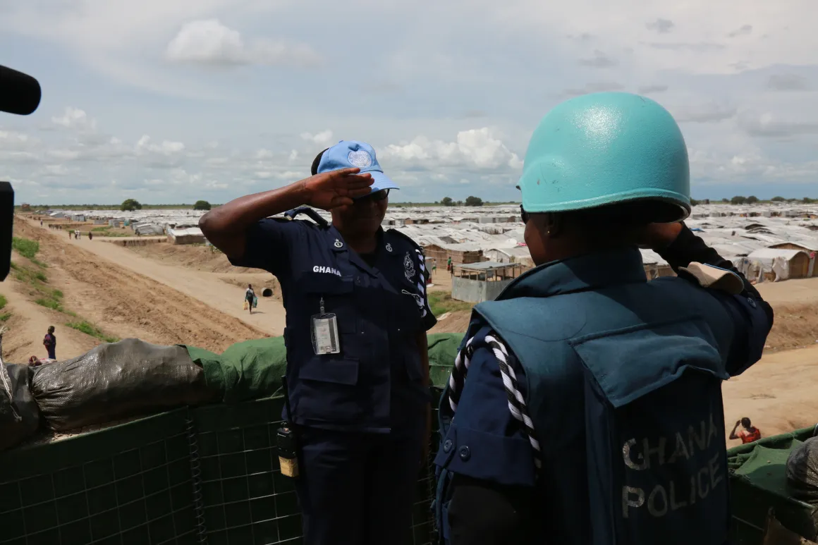 Assistant Superintendent of Police, Sylivia Adzo Sowlitse, salutes one of the officers under her command. Photo: UNMISS/ Nektarios Markogiannis