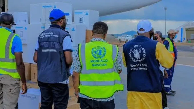 Staff from the mission and WHO receiving equipment at airport