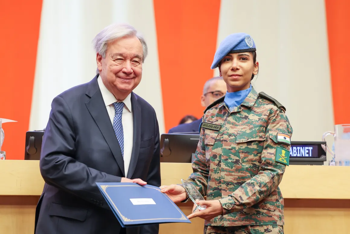 Major Abhilasha Barak receiving the Military Gender Advocate of the Year Award from UN Secretary-General António Guterres
