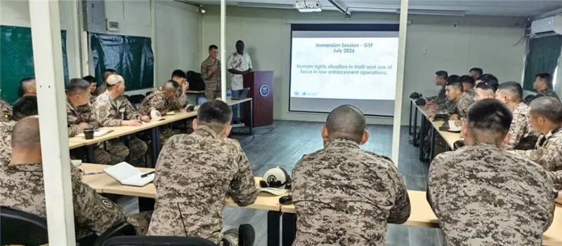 UNSOH staff member briefing members of the Mongolian GSF contingent on the human rights situation in Haiti.