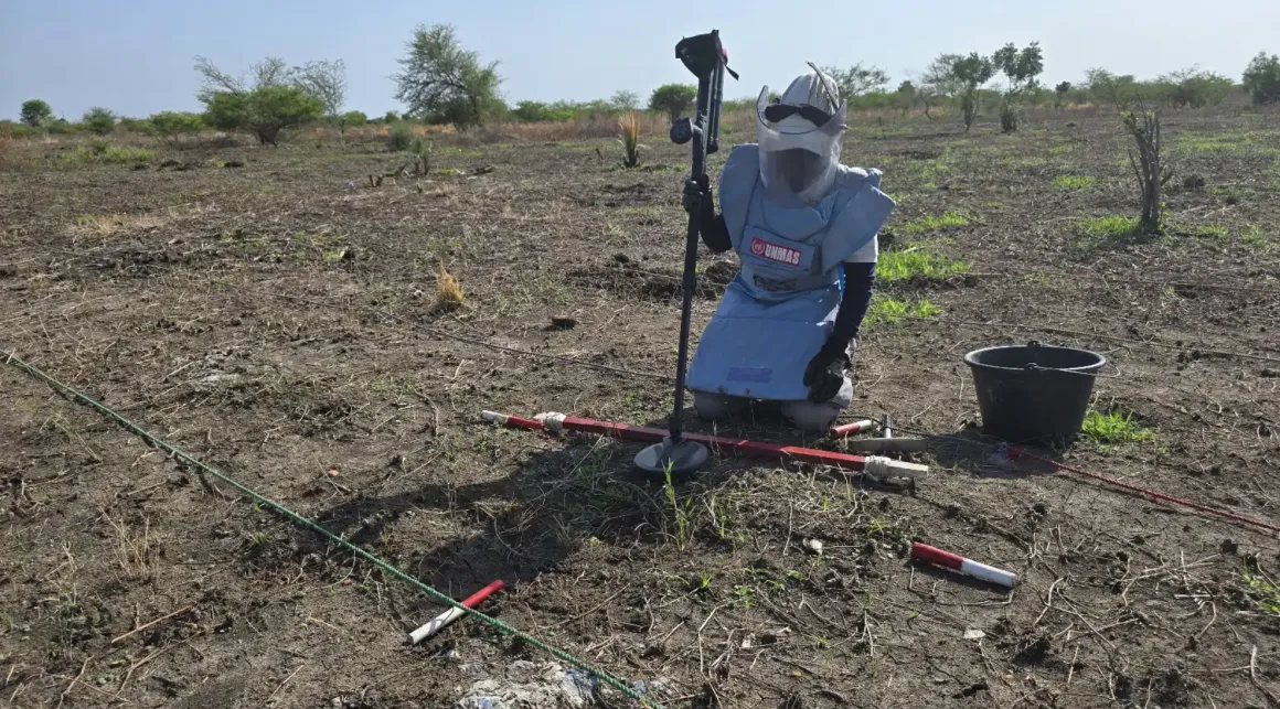 A deminer conducts clearance operations in Bilinyang Payam, Central Equatoria State, helping make land previously contaminated by explosive hazards safe for civilian use. \