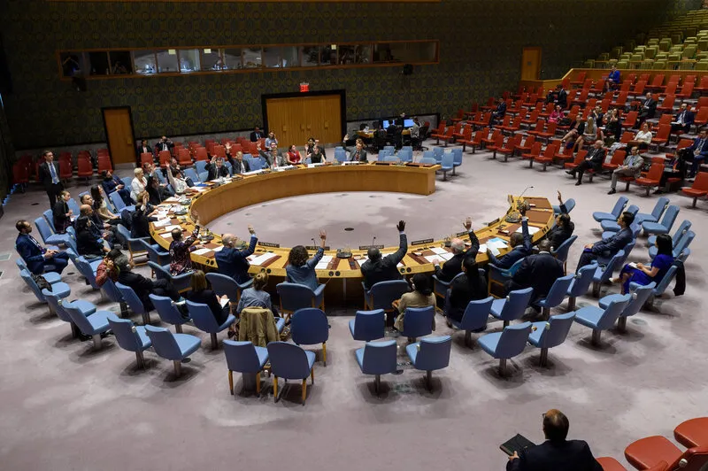 Security Council members voting on the resolution.